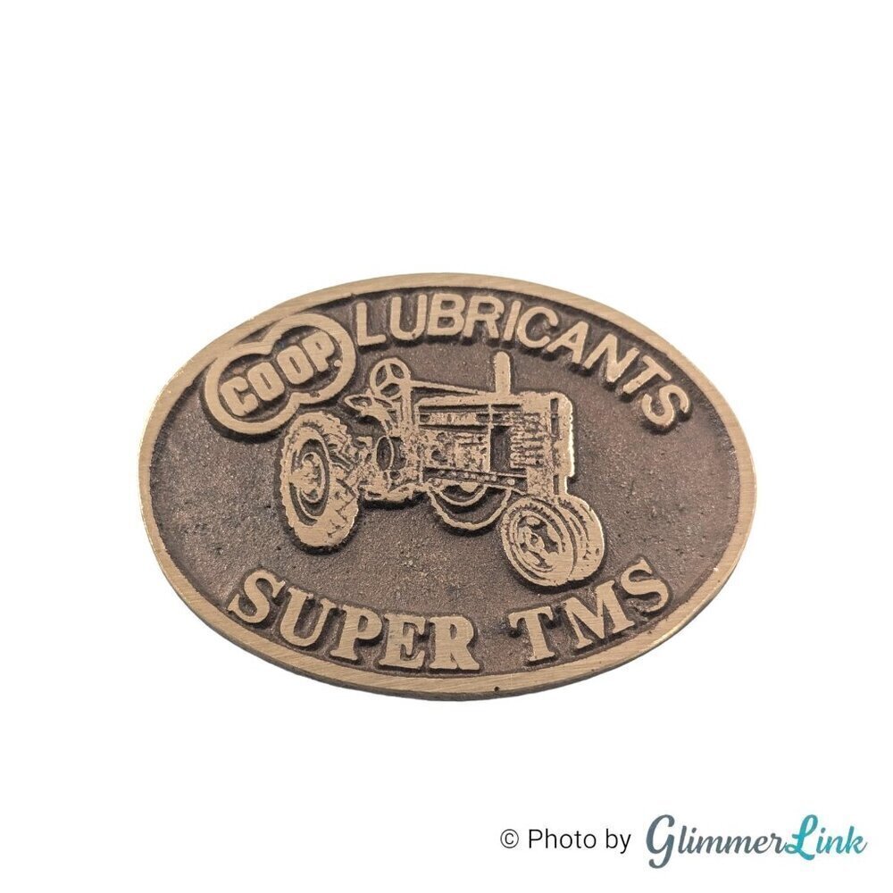 Vintage Farmland Ind John Deere Tractor Lubricant Oval Brass Belt Buckle